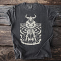 Minotaur holding axe in labyrinth on dark grey t-shirt.