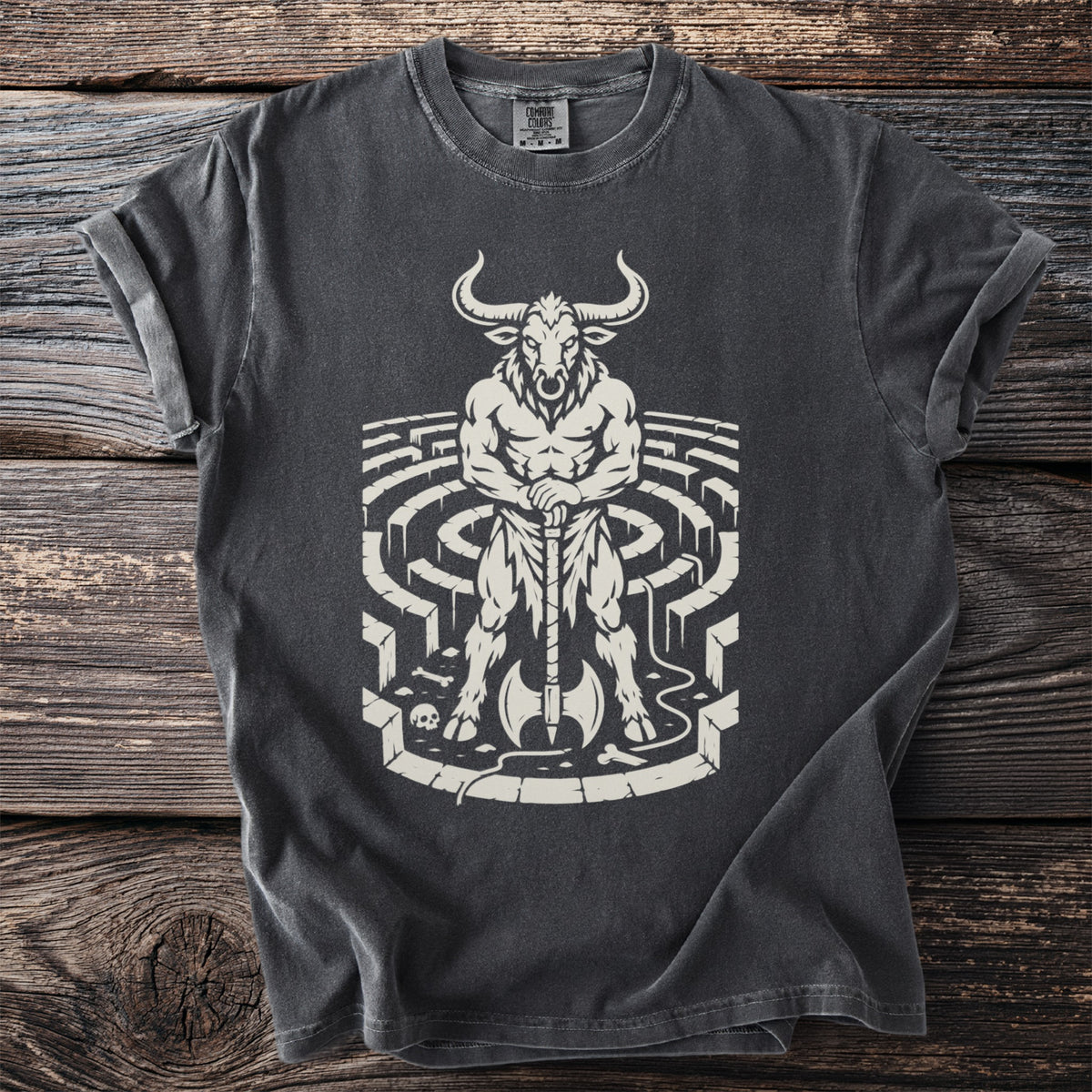 Minotaur holding axe in labyrinth on dark grey t-shirt.