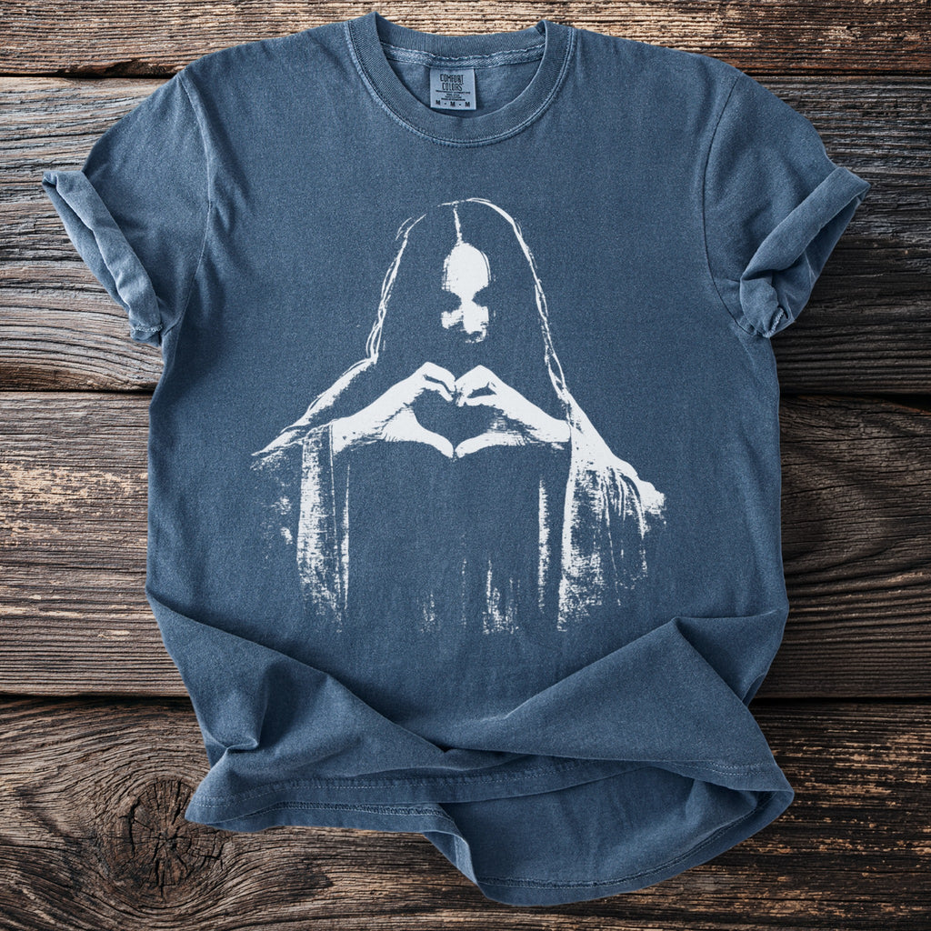 Blue t-shirt with white graphic of person making a heart shape with hands.