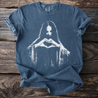 Blue t-shirt with white graphic of person making a heart shape with hands.