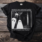 Black t-shirt with "protect our national parks" and spooky forest scene.