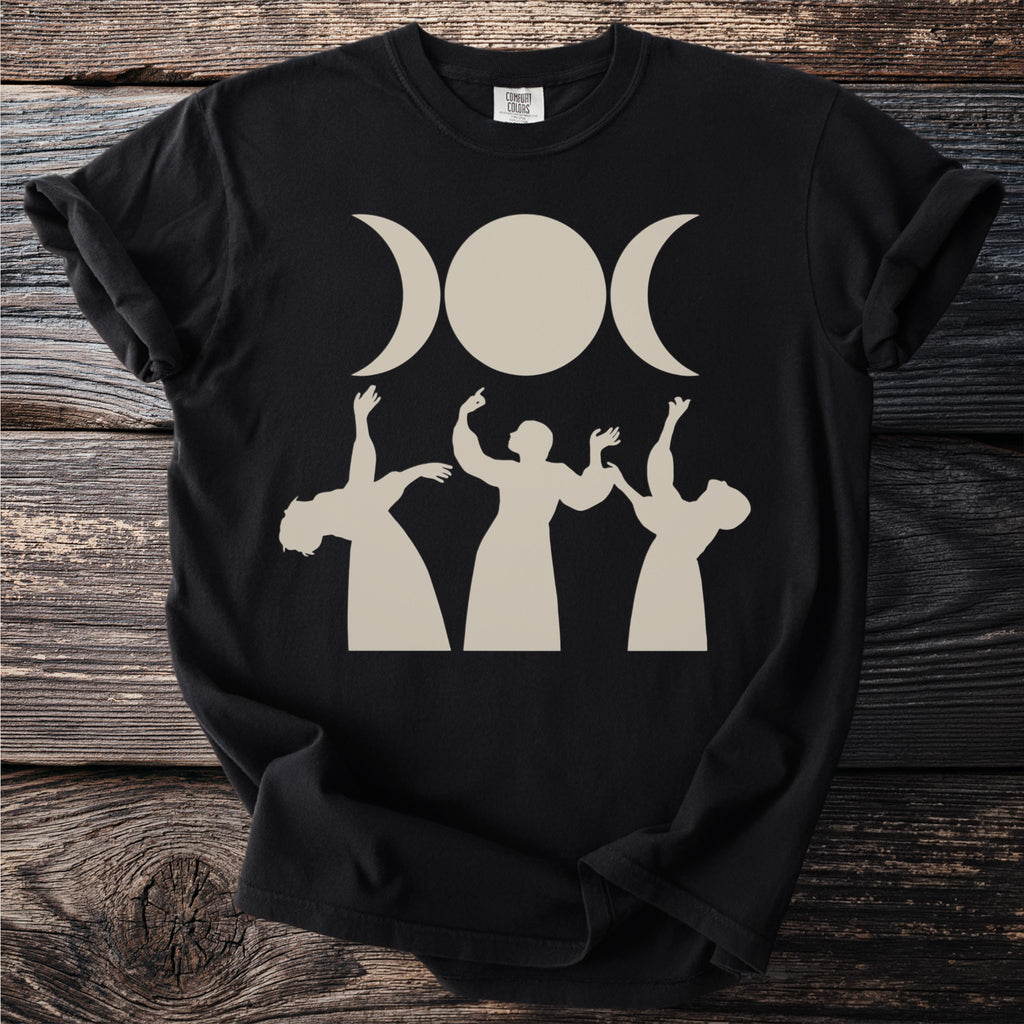 Black t-shirt with a triple moon design and three figures reaching up.