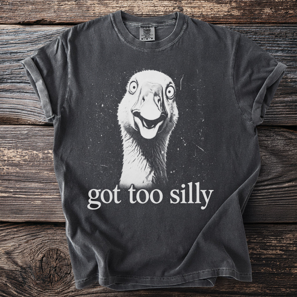 Dark gray t-shirt with a distressed print of a startled goose and the text "got too silly".