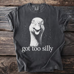 Dark gray t-shirt with a distressed print of a startled goose and the text "got too silly".