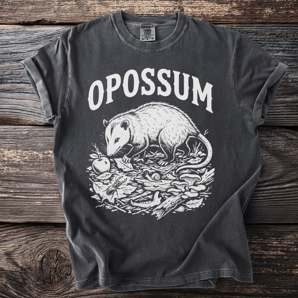 Dark gray t-shirt with white opossum graphic and text "OPOSSUM"