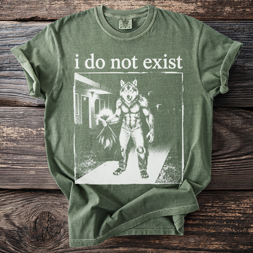 Green t-shirt with "i do not exist" text and werewolf graphic holding flowers.