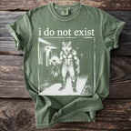 Green t-shirt with "i do not exist" text and werewolf graphic holding flowers.