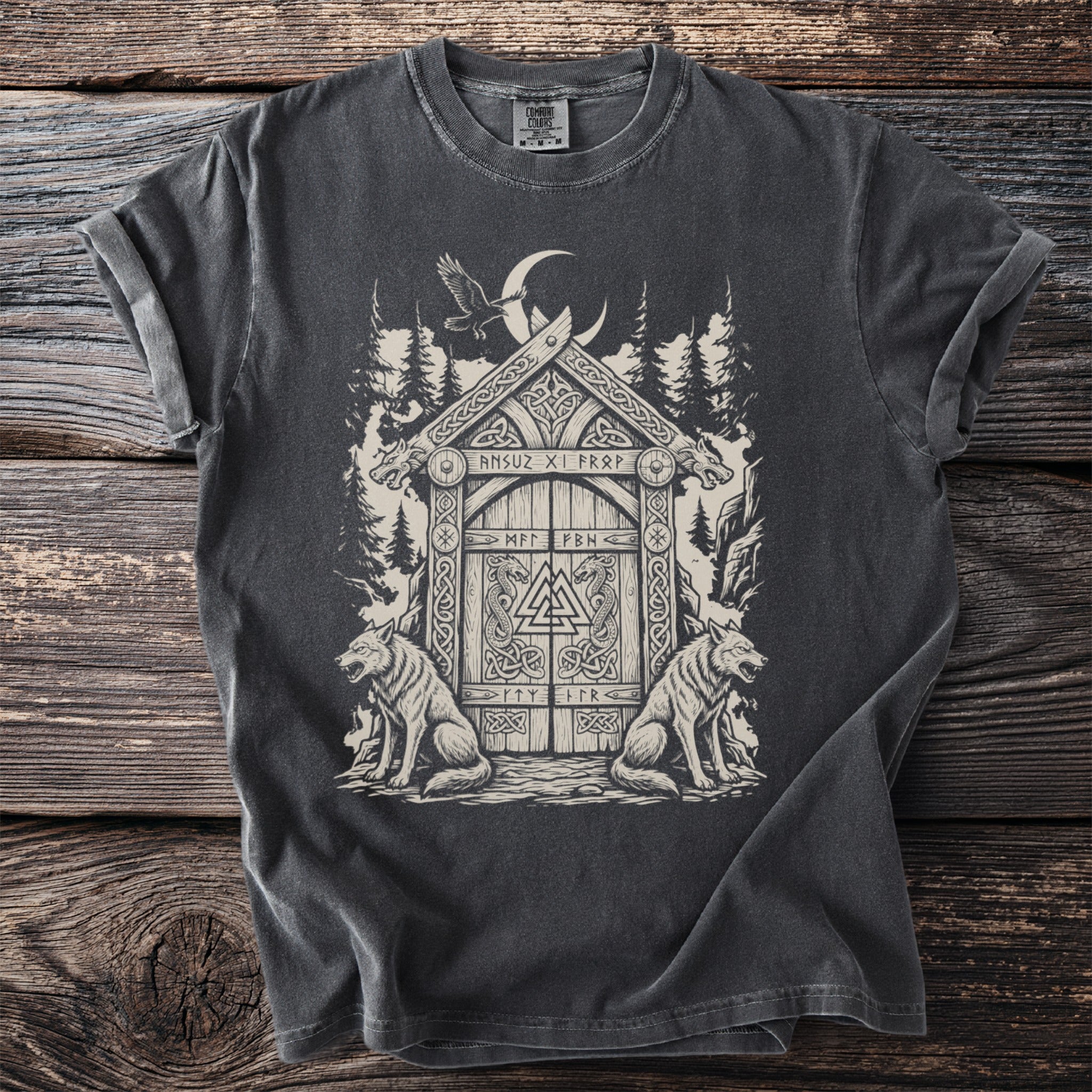 Dark grey t-shirt with Viking-inspired graphic of a doorway, wolves, and raven.