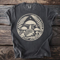 Dark grey t-shirt with a circular forest graphic featuring a hedgehog, bird, mushrooms, and ferns.