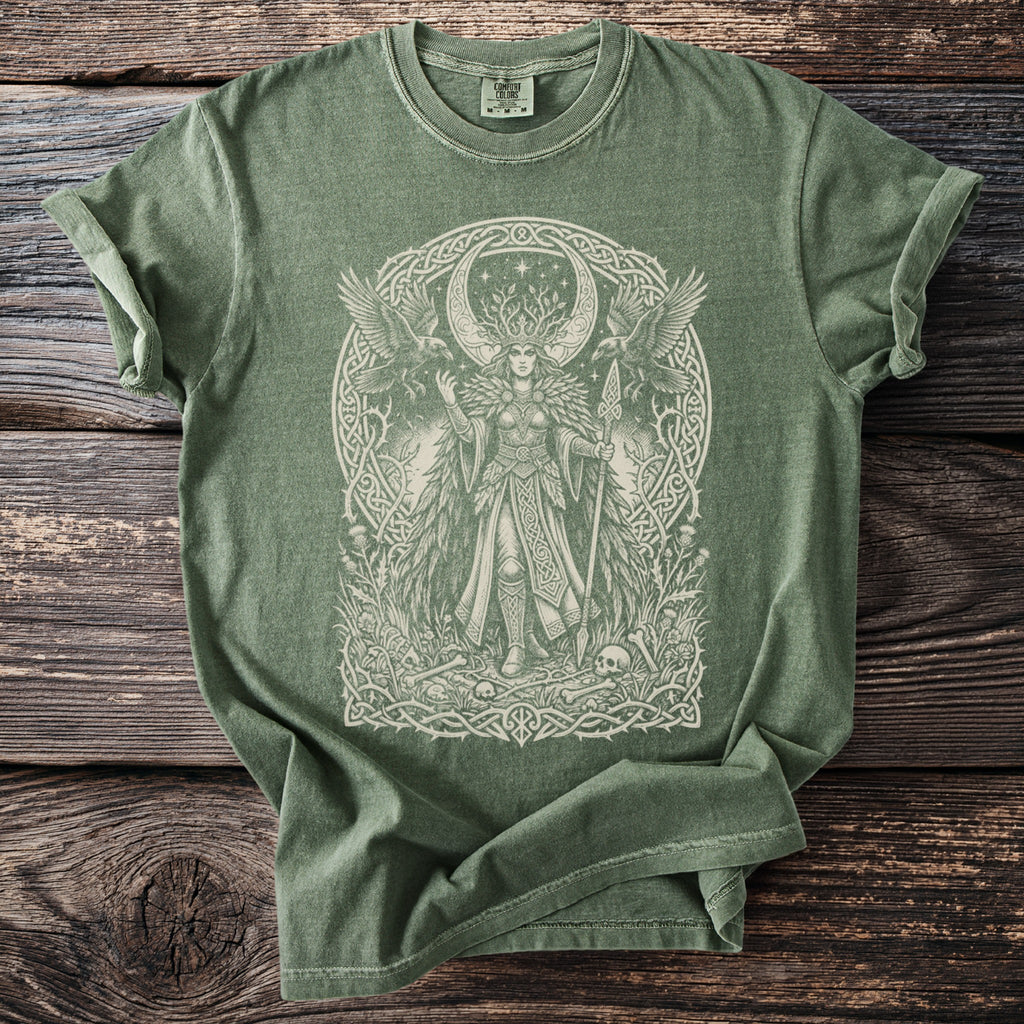 Green t-shirt with a white graphic of a Norse goddess and ravens.