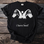 Black t-shirt with swan graphic and "i have beef" text.