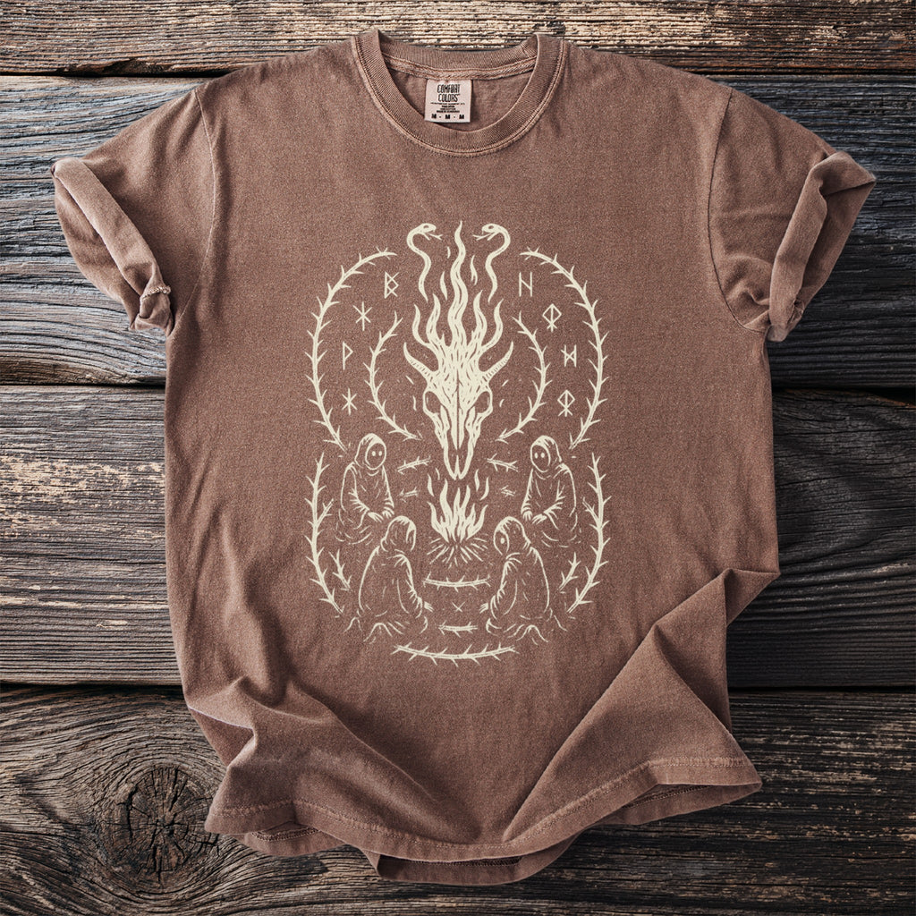 Brown t-shirt with light beige graphic of a dragon skull, fire, figures, and runes.