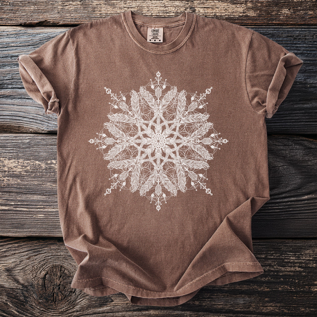 Brown t-shirt with white feather mandala graphic and Comfort Colors tag