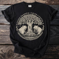 Black t-shirt with a cream design of two bears flanking a tree with runes.