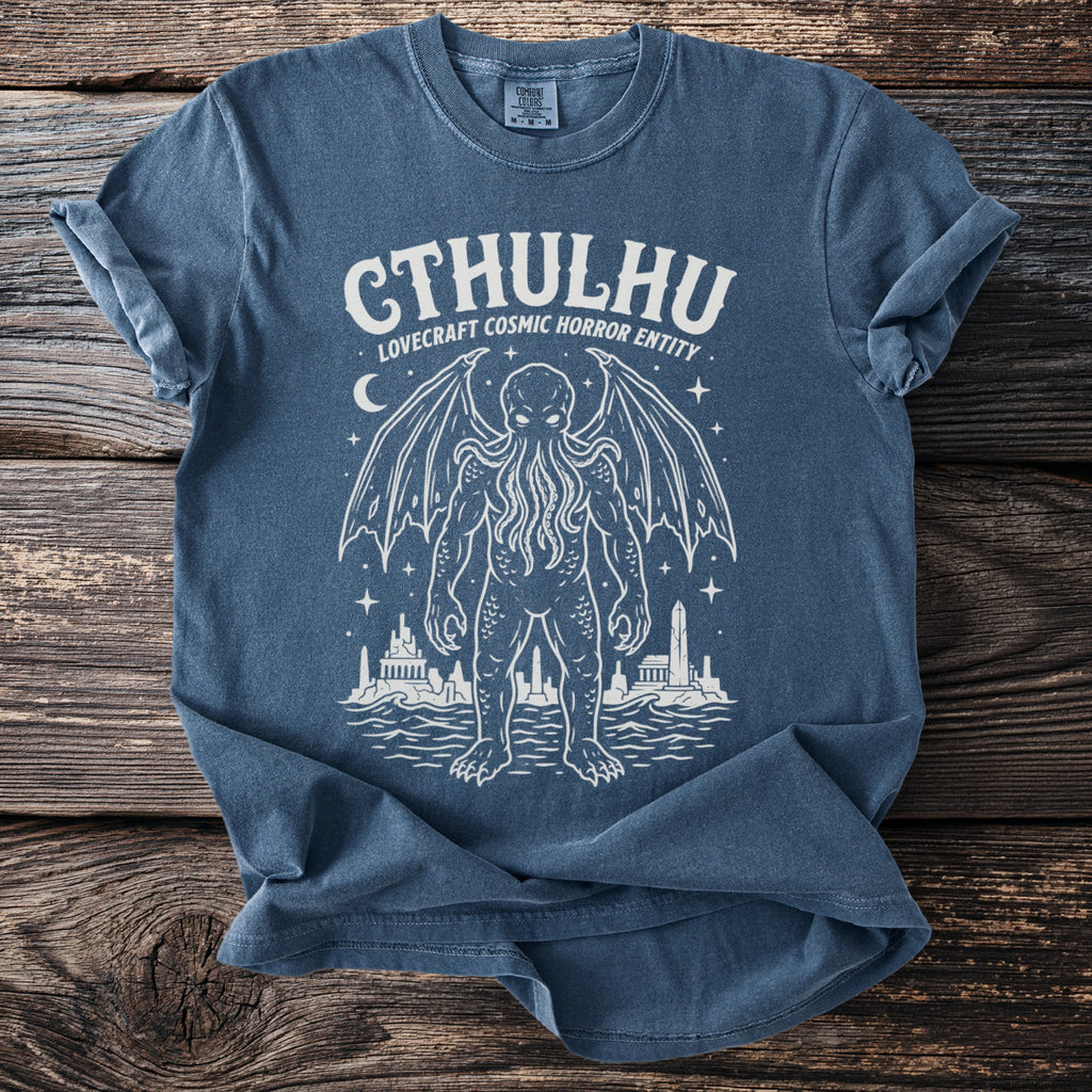 Blue t-shirt with white Cthulhu "Lovecraft Cosmic Horror Entity" graphic.