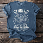 Blue t-shirt with white Cthulhu "Lovecraft Cosmic Horror Entity" graphic.