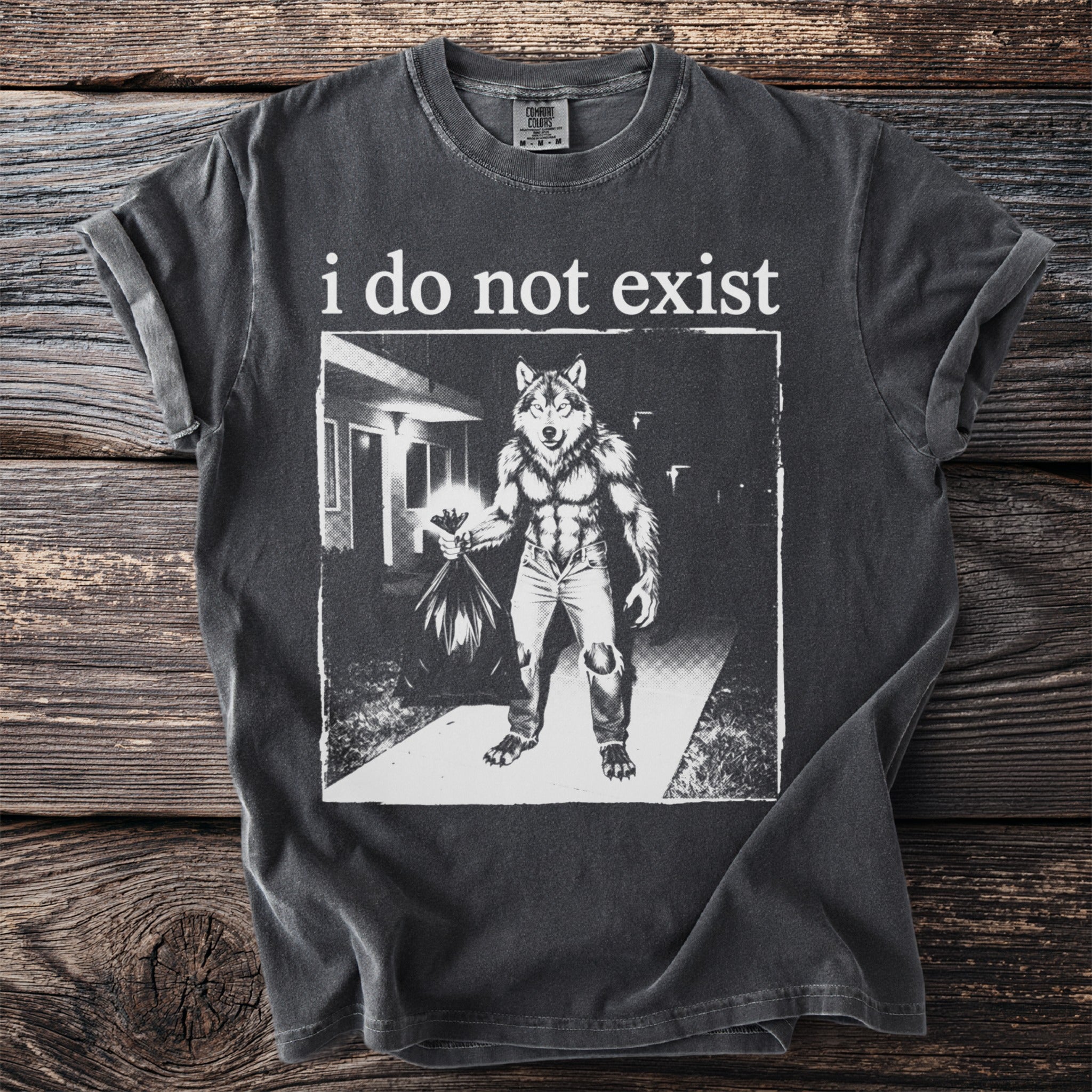 T-shirt with text "i do not exist" and a werewolf holding flowers.