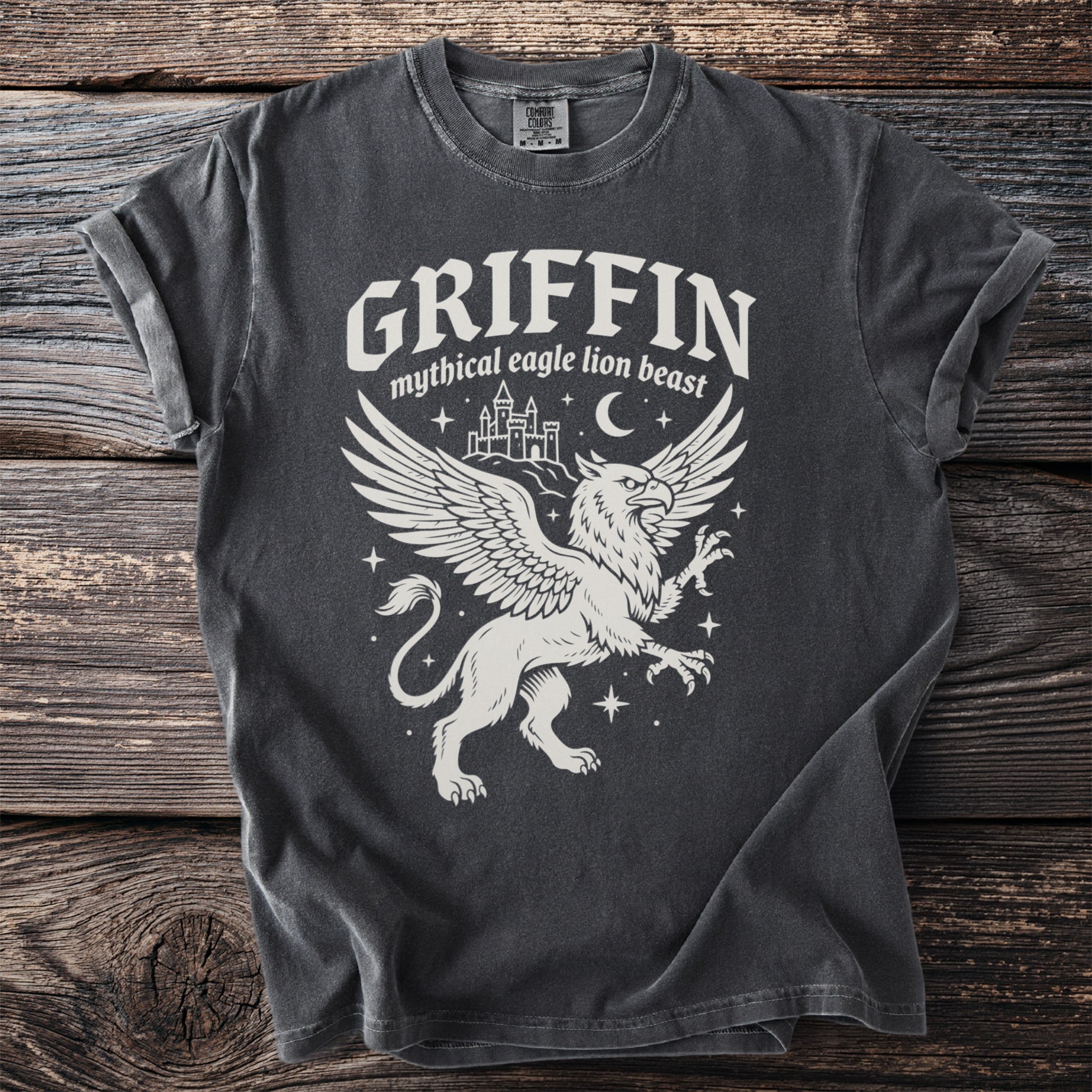 Dark t-shirt with a white griffin graphic and the text "GRIFFIN mythical eagle lion beast."
