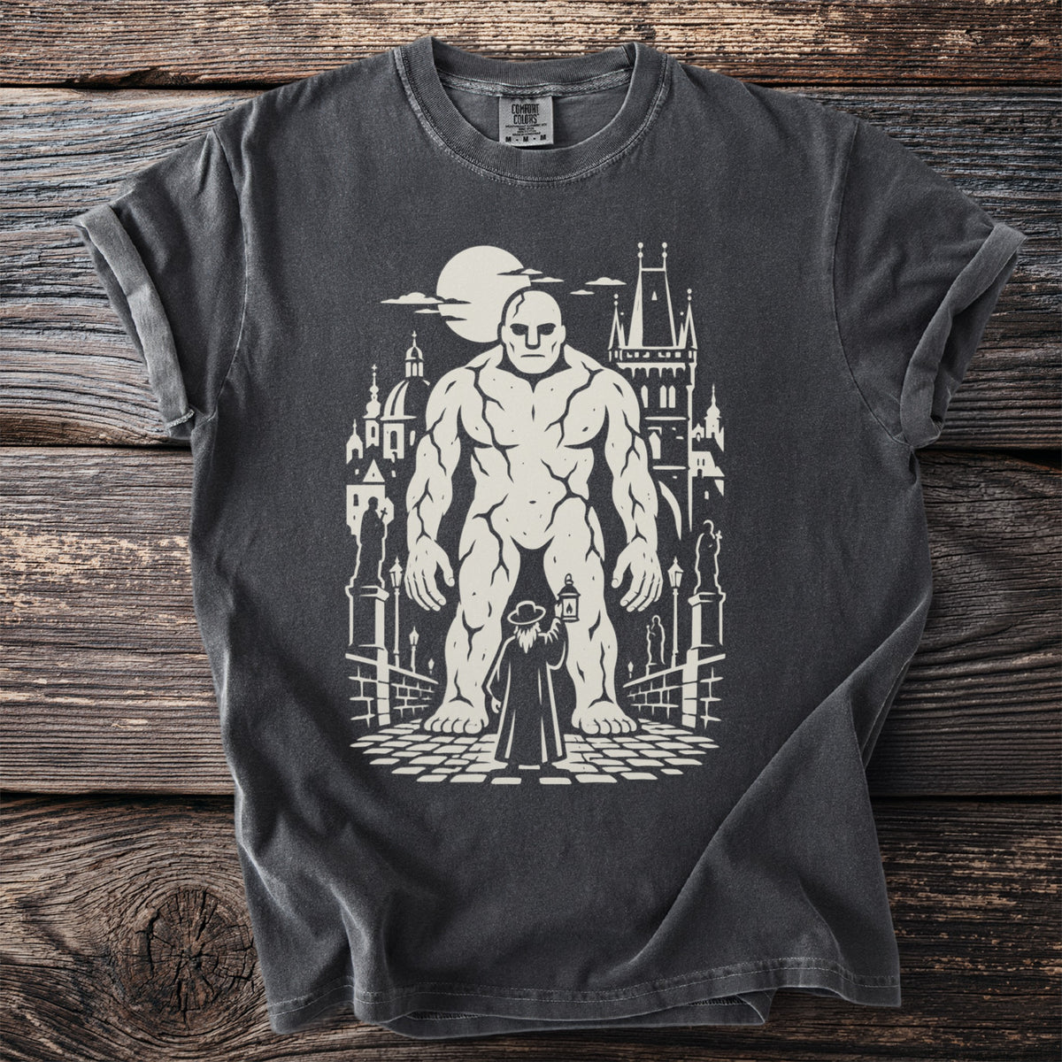 Graphic of a giant and a person with a lantern in a city with a moon.