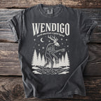 Dark grey t-shirt with white graphic of a Wendigo and text "Wendigo north american cryptid legend".