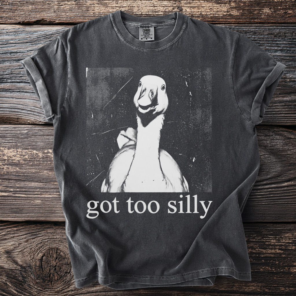 Dark gray t-shirt with a distressed graphic of a goose and text reading "got too silly".