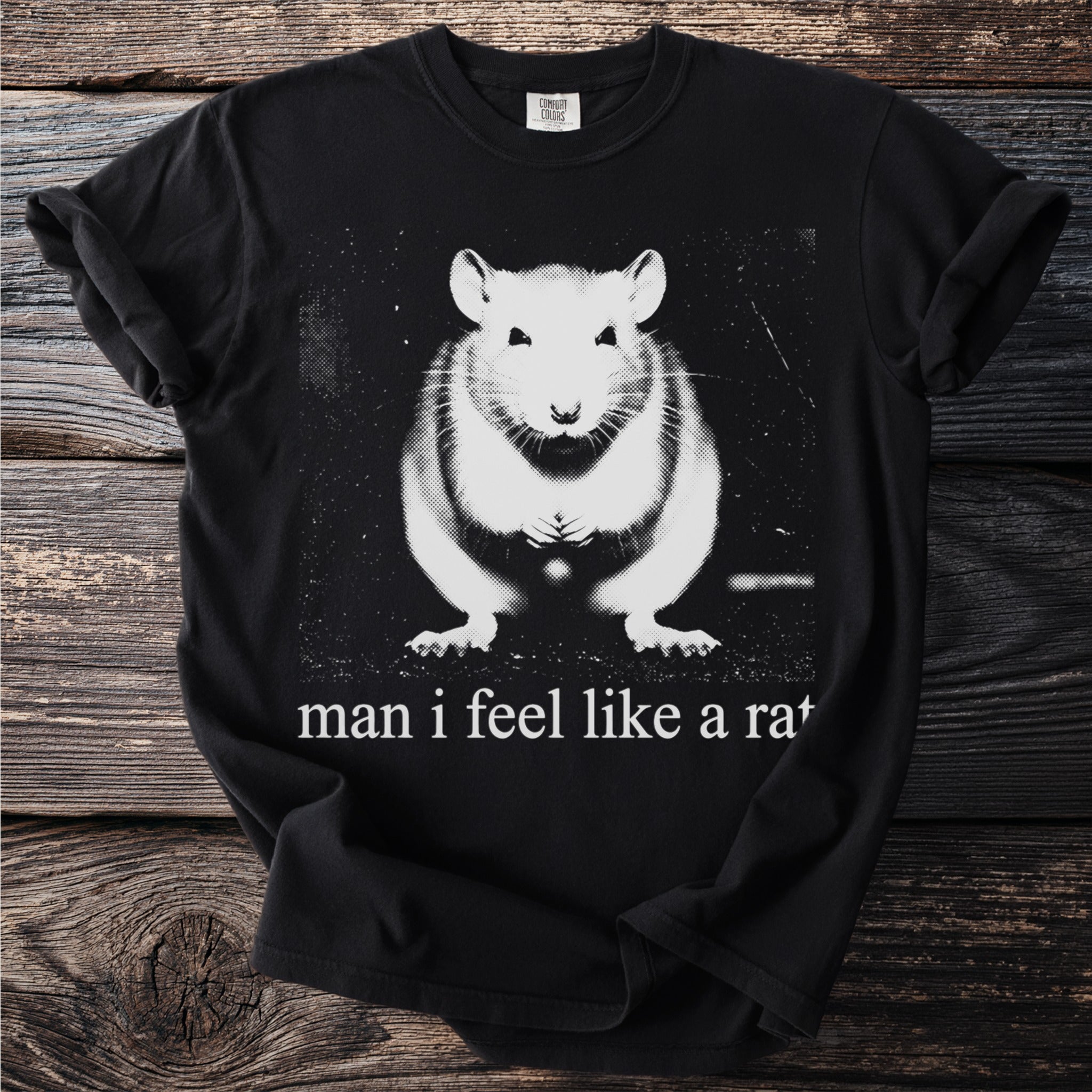 Black t-shirt with a vintage-style graphic of a rat and the text "man i feel like a rat".
