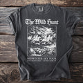 The Wild Hunt Midwinter Sky Tour t-shirt with riders and dogs over a village.