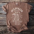 Brown t-shirt featuring "Hypnos greek god of sleep" graphic with winged figure and moon.