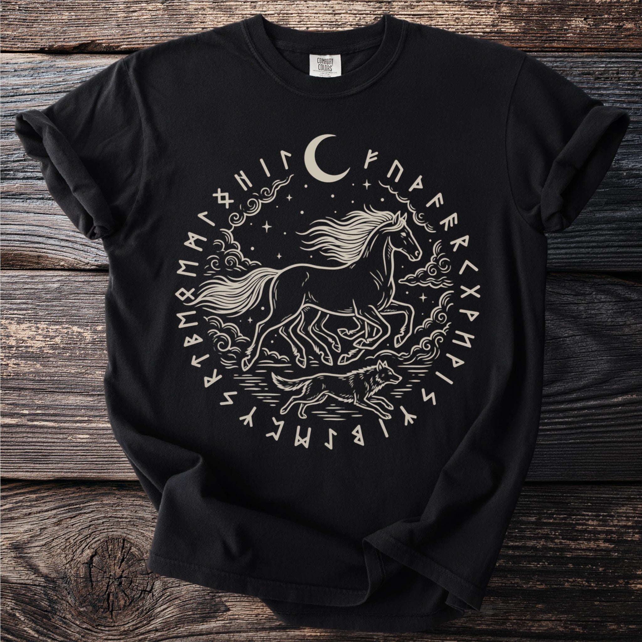 Black t-shirt with circular Nordic knotwork design of a horse and wolf under a moon.