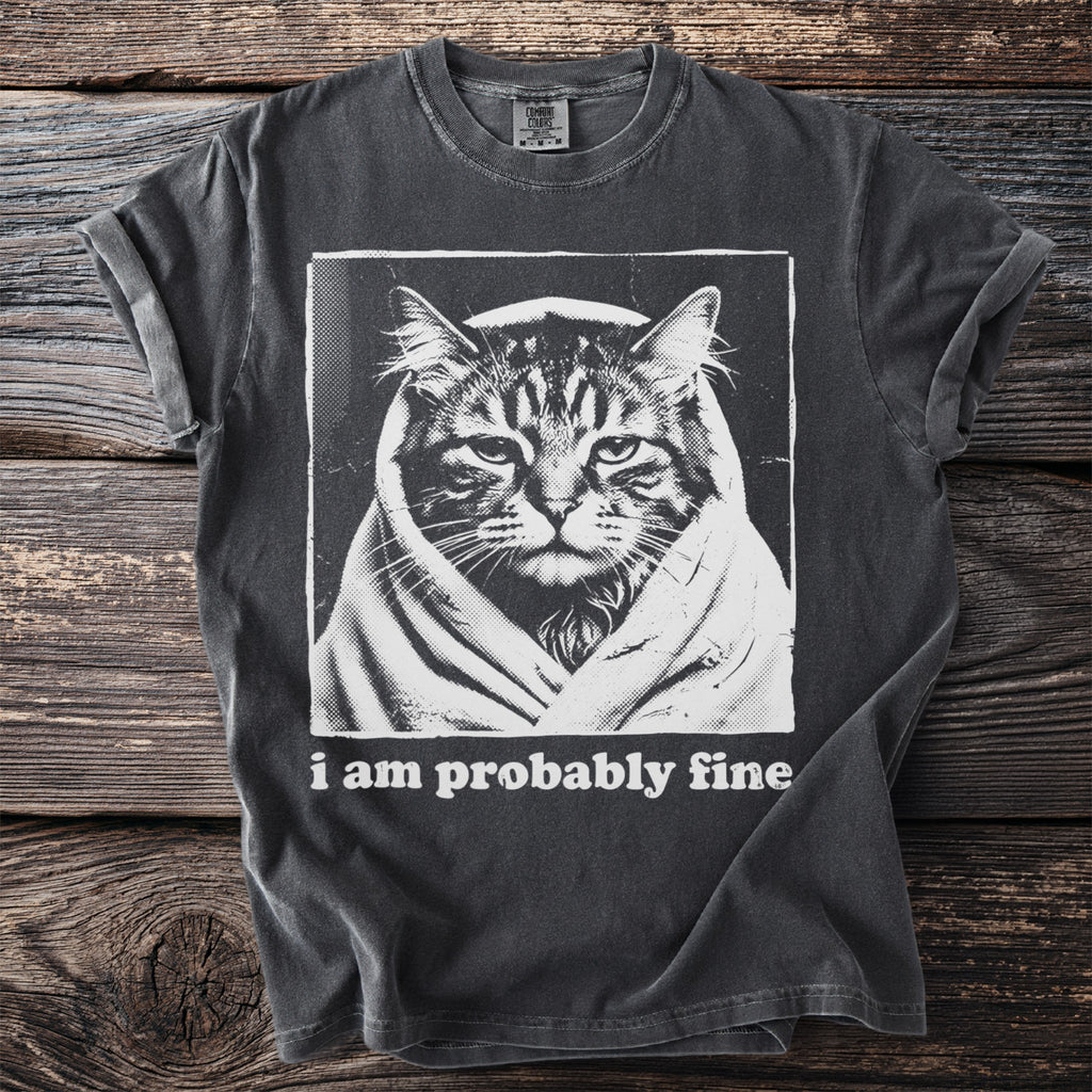 Dark grey t-shirt with a graphic of a cat wrapped in a blanket and text "i am probably fine".