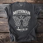 Dark grey t-shirt with white Mothman graphic, "west virginia cryptid legend" text.