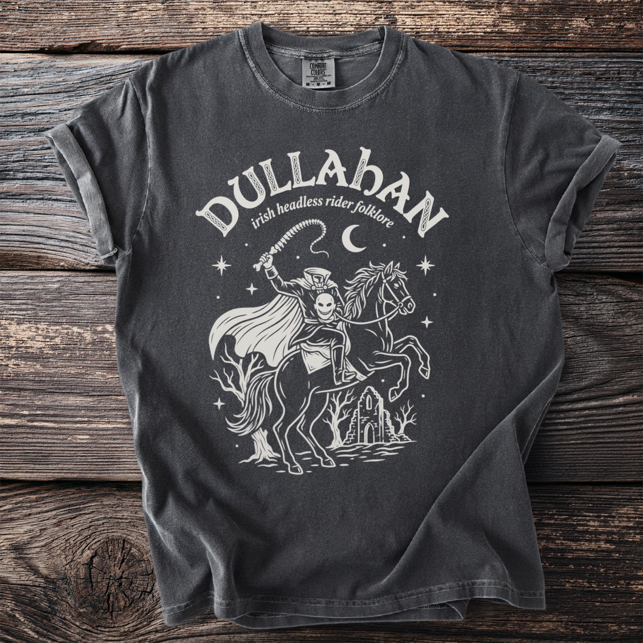 Grey t-shirt with "Dullahan irish headless rider folklore" text and spooky rider graphic.