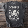Dark gray t-shirt with "OCTOPUS NINE BRAINS all disagreeing!" graphic.