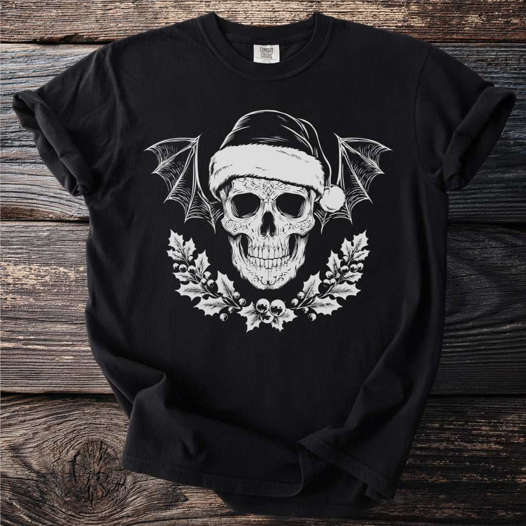 Black t-shirt featuring a skull with bat wings, Santa hat, and holly branches.