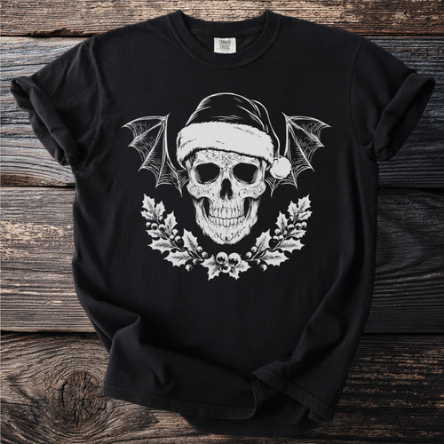 Black t-shirt featuring a skull with bat wings, Santa hat, and holly branches.