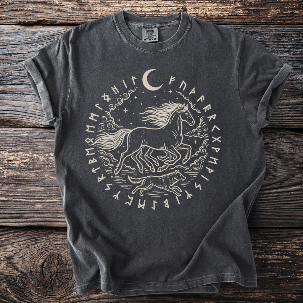 Dark t-shirt with a central circular design featuring a running horse, wolf, moon, and runes.