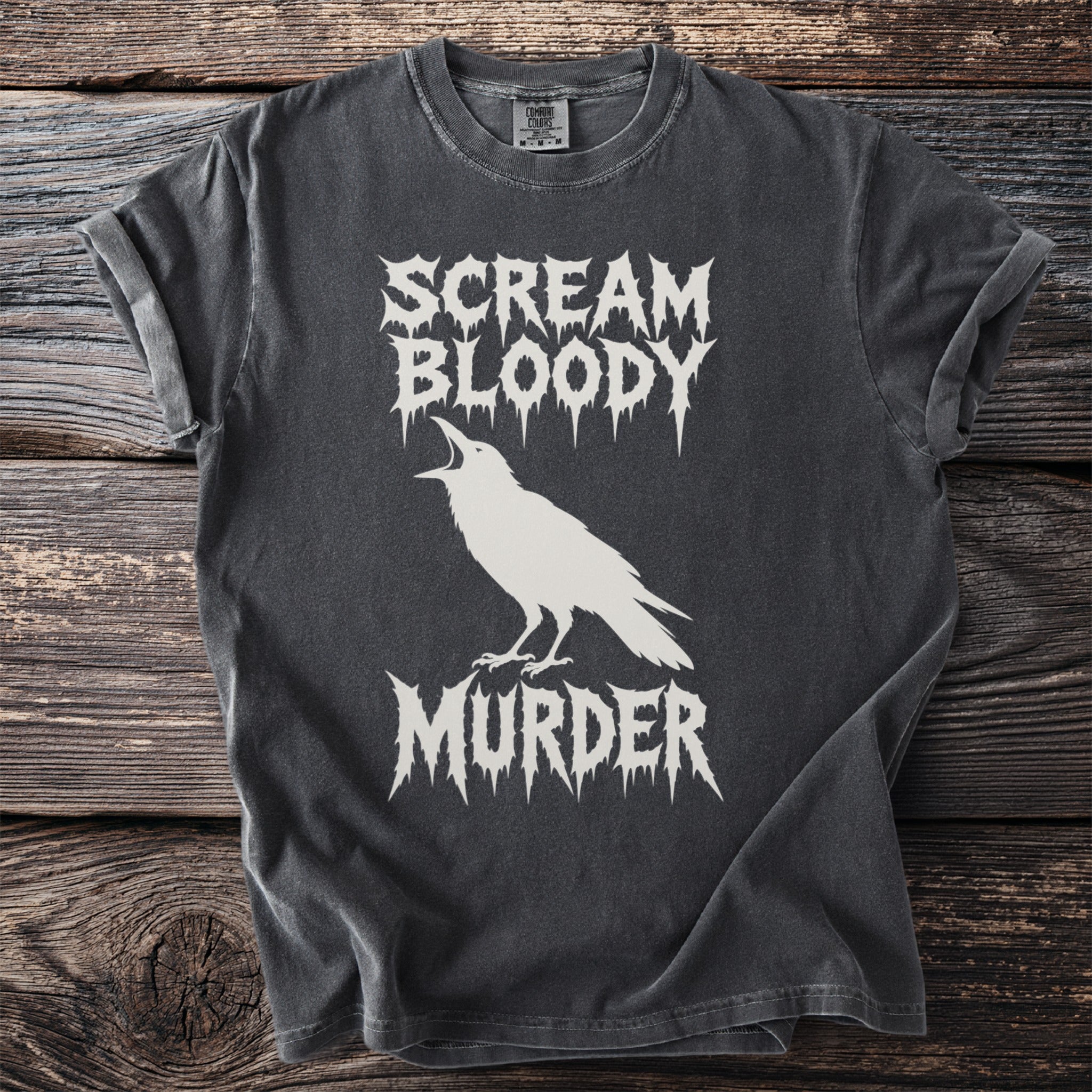 Dark grey t-shirt with white "Scream Bloody Murder" text and raven graphic.