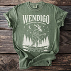 Green t-shirt with "WENDIGO north american cryptid legend" and a skeletal figure.
