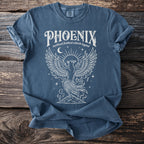 Blue t-shirt with white phoenix graphic and text "PHOENIX mythical firebird rebirth legend ".