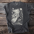 Dark grey t-shirt with distressed gothic print of a ghost, cottage, moon, and birds.
