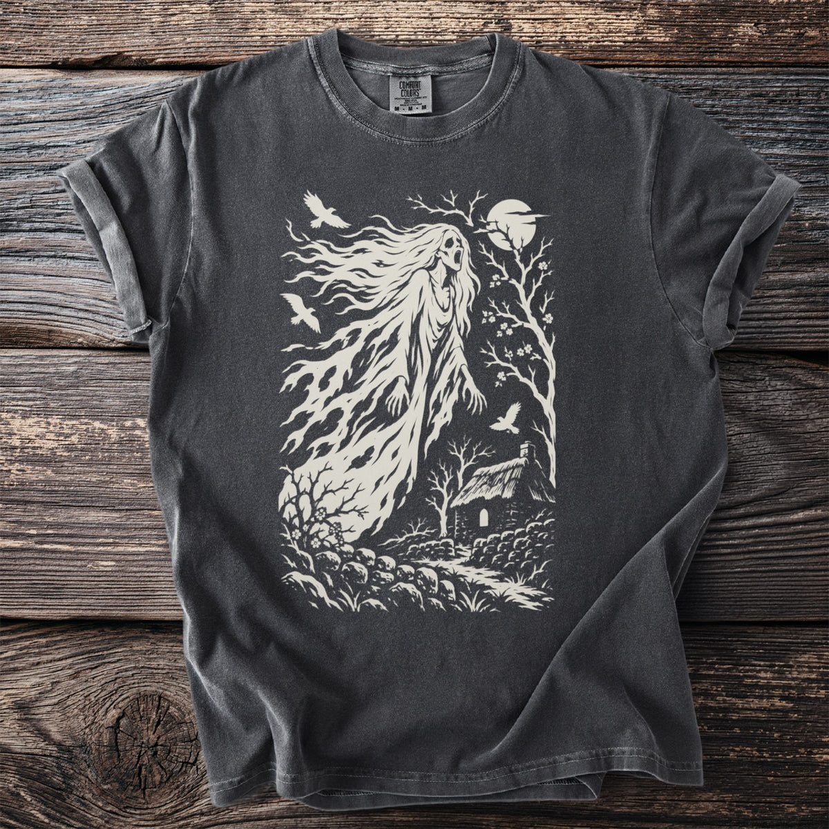 Dark grey t-shirt with distressed gothic print of a ghost, cottage, moon, and birds.