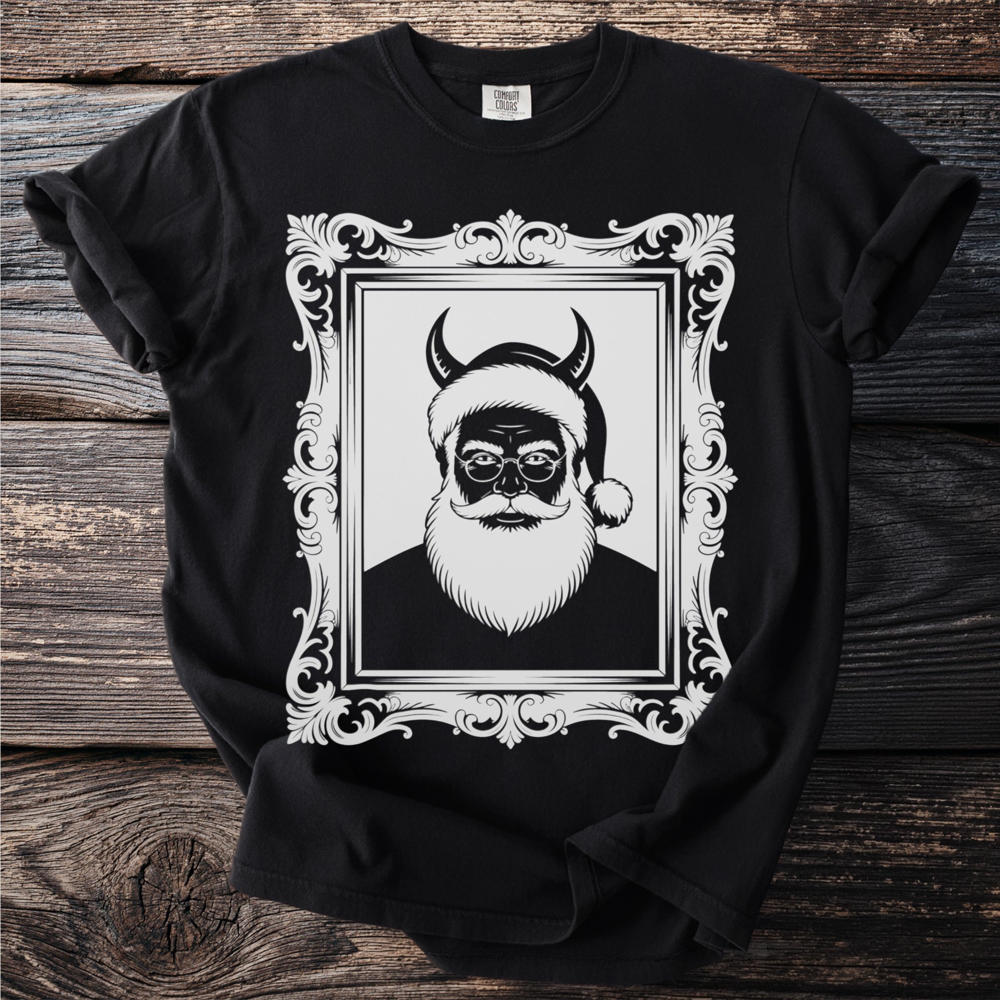 Black t-shirt with a framed illustration of a devil Santa Claus.