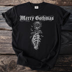 Black t-shirt with "Merry Gothmas" text and skeleton hand holding a rose graphic.