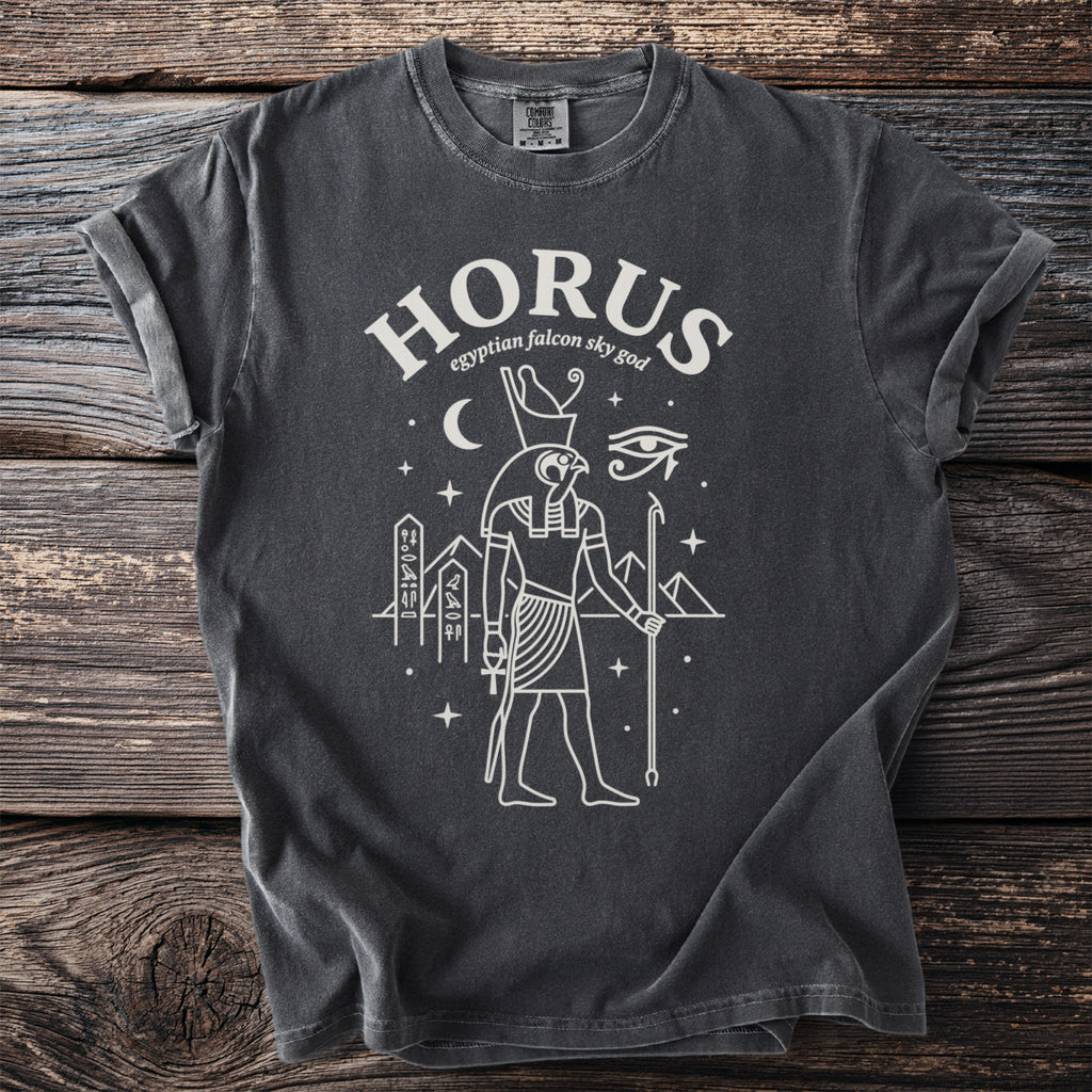 Dark charcoal t-shirt with white Horus falcon god graphic and text.