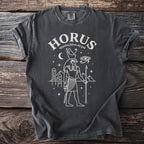 Dark charcoal t-shirt with white Horus falcon god graphic and text.