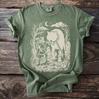 Green t-shirt with a Viking warrior facing a chained wolf under a crescent moon.