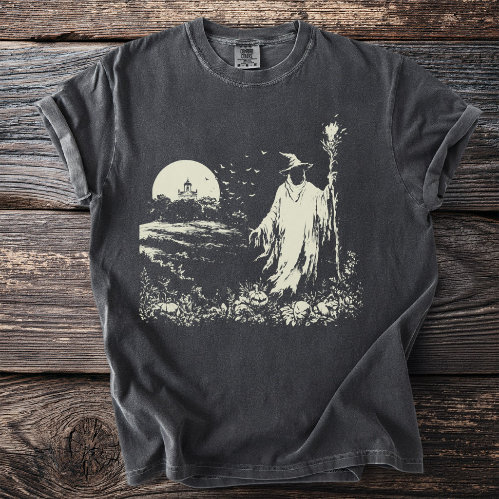 T-shirt with a vintage wizard graphic featuring a staff, pumpkins, and a spooky moonlit scene.