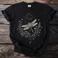 Black t-shirt with cream dragonfly, crescent moon, stars, and floral design.