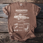 Brown t-shirt with diagram explaining characteristics and behaviors of a mudskipper.