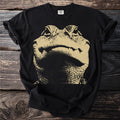 Black t-shirt with a close-up illustration of an alligator's head in tan.